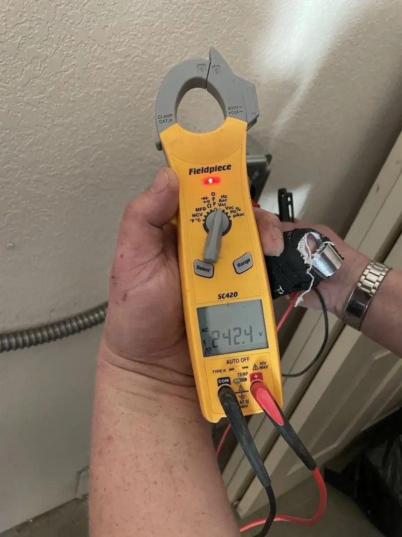 Voltage testing with clamp meter during Generator Installation in Minnetrista